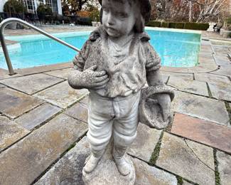 Many Concrete Statuary Pieces around