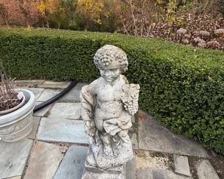 Many Concrete Statuary Pieces around