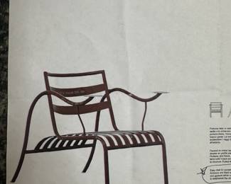 Cappellini Easy Chair in varnished metal, with fame in tube, seat and back in flat bars. Armrests are fitted with drink trays. Includes custom cushion.