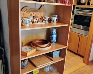 6 Tier Bookcase, Circle of Cats Votive Candle Holder, Crystal Swirl Pattern Cookie Jar, Set of 4 Lenox Winter Greetings Mugs, Folk Art Cat Collapsable Basket, Glass Sleeping Kitten on Nest Candy Dish, Pair of Turned Wood Bowls