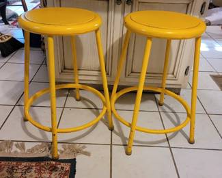 Yellow metal stools