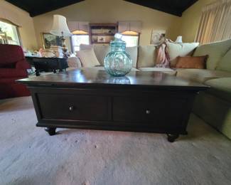 Brown wood tone coffee table with two drawers