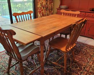 Table with 5 chairs. Ends drop 
Cochrane Ind.
Country Kitche 