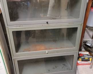 Metal cabinet. Glass fronts 