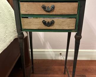 There are two of these adorable side tables