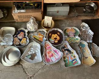 Wilton cake pans: Pocahontas, Barbie, Garfield, Darth Vader, Hollie Hobie, more