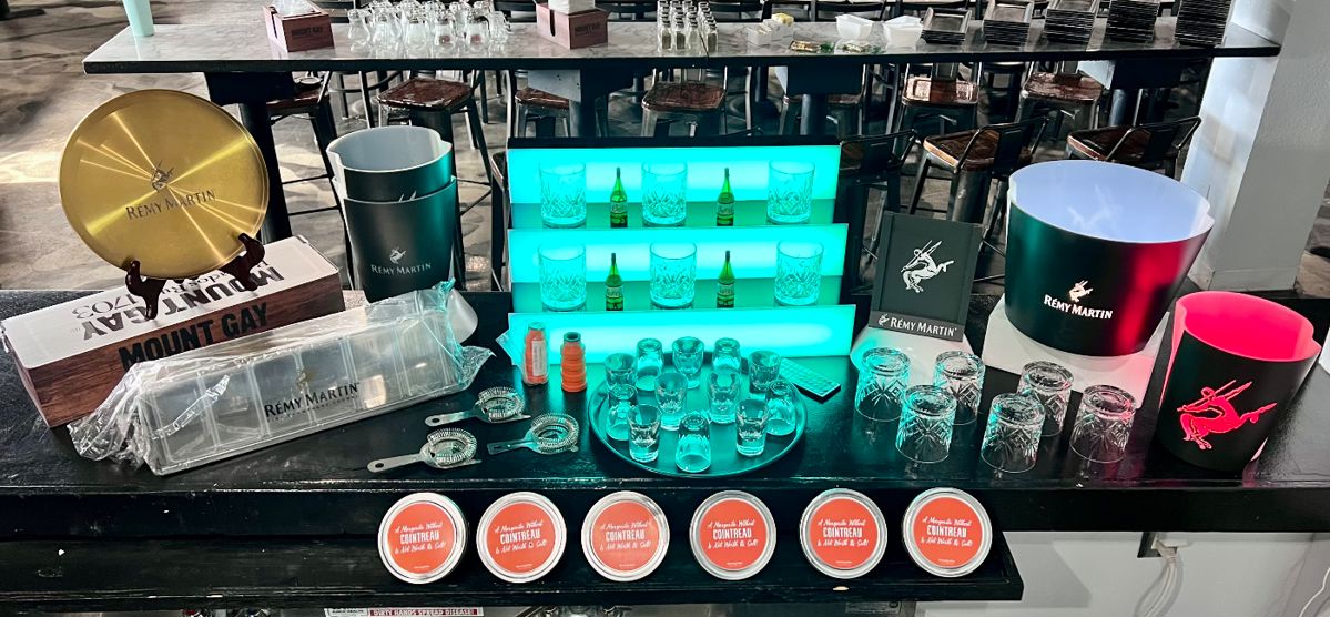 Lighted 3-Tier Countertop Liquor Display, Bar Caddie Condiment Dispenser, Remy Martin Cognac Lighted Ice Buckets, Remy Martin Rock Glasses (We have over 50 of these), and other Remy Martin Cognac Items