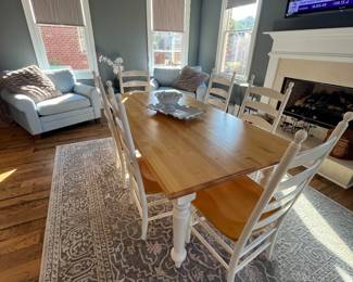 Oversized occasional chairs, dining set and rug 