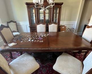 Detail in dining room table chairs and china closet 