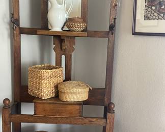 Antique entry way hutch, basket collections, vintage artwork.