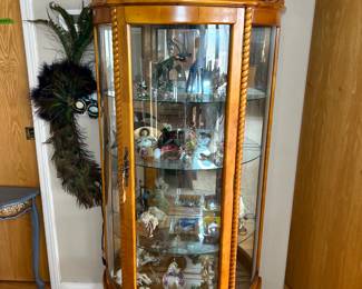 Glass Curio display cabinet with assorted glass & wood collector figures. 