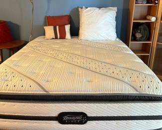 Queen Beauty Rest Mattresses and box spring like new condition used in the guest room. 
Display cabinets set of two.