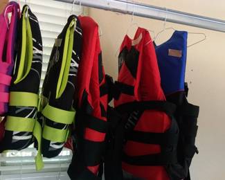 Several (Look unused) flotation devices. 2 child, 2  youth, 3 adult. Excellent condition.