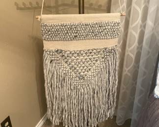 Macrame wall hanging only.  stand not available.