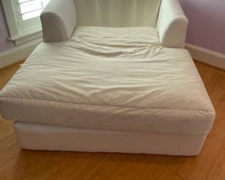 Large Floor Loveseat style.  Very comfortable. 