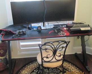 Gaming Table.  Curved monitor.  Chair. Area Rug.