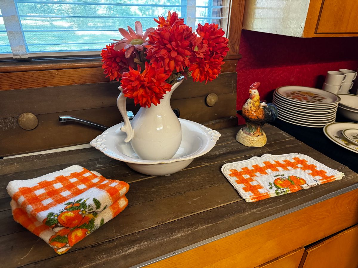 Water Pitcher & bowl.  Colorful cup towels.  Musical Rooster soap dispenser 