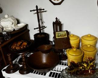 Several vintage  canister sets:  Yellow, red, white.  Wooden salad sets, mug holder, recipe holder.  Remember most items are vintage!  