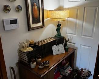 Art, books, roosters and vintage television cabinets 