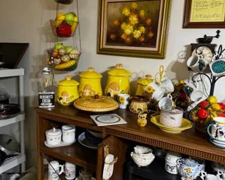 Vintage canister sets, yellow, reds, and white. 