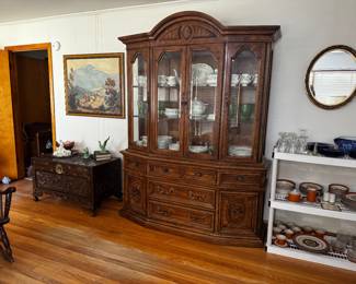 Solid wood China cabinet.  Matching dining tables & buffet.   China Top with light. 


