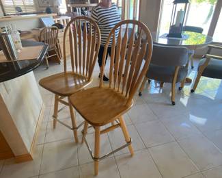 two of the four bar stools