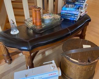 Books, old cheese container