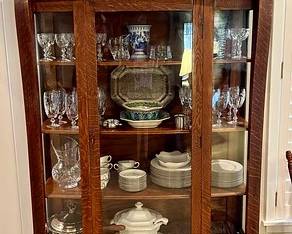 Glass front antique cabinet