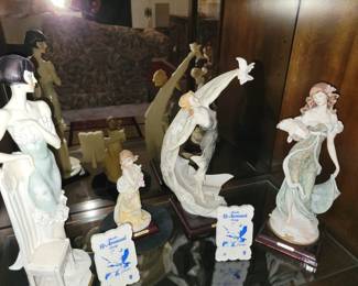 G. Armani figurines