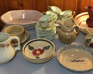 Many pieces of vintage pottery
