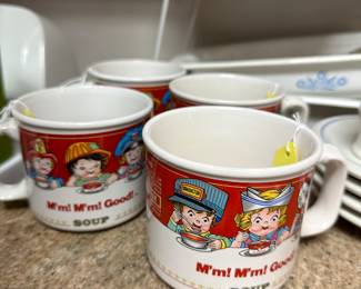we have four Campbell soup mugs in the pattern ‘Professionals’, wrapped in six differently dressed kids depicting professions.