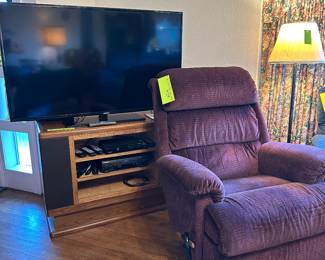 Big tv works great, comfy recliner is a LaZBoy