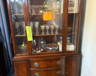 This mahogany china cabinet is one smaller in stature than most…perfect for smaller rooms