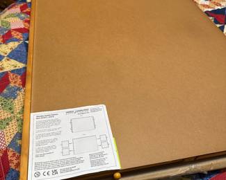 it’s a puzzle board for putting together puzzles…and it has four pullout drawers to hold puzzle pieces 