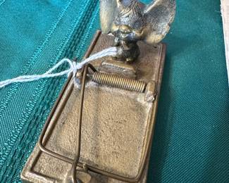this might be the cutest little thing in the sale. It’s a brass paperweight shaped like a mouse trap!!!