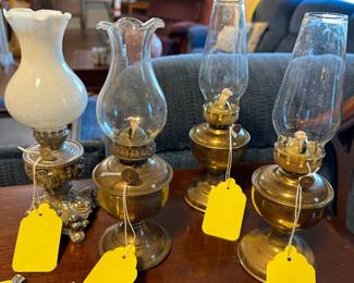 cutest little brass hurricane Lanterns two of three brass lantern are made in England