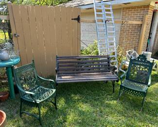 two HEAVY cast iron chairs by Hinderer’s Iron Works New Orleans, marked on top!