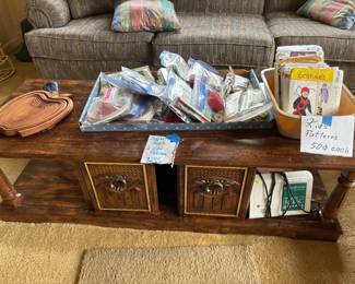 Kid’s patterns, sewing notion on pretty coffee table