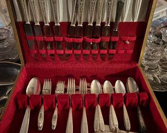 Three sets of flatware