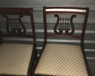 Six mahogany chairs, two with arms are in good condition. Mahogany dropped leaf table to sell with chairs.      