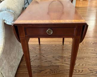 Drop side table. One side is missing leaf support
