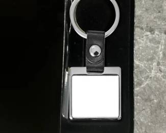 Square Sublimatable Keychain with White Insert - 3-3/4" x 1-3/8".  Made with high-quality stainless steel, aluminum, and leather. Comes in a gift box.