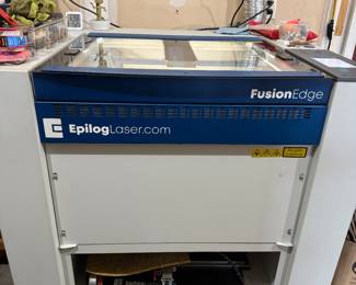 2021 Fusion Edge 60-watt, CO2 Laser, 24" x 24" honeycomb bed, with IRIS camera system. Includes air assist pump and rotary attachment. If you're looking for fast, reliable, precision cutting and engraving, this is the machine for you!