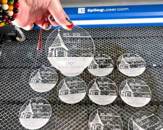 Samples from 2021 Fusion Edge 60-watt, CO2 Laser, 24" x 24" honeycomb bed, with IRIS camera system. Includes air assist pump and rotary attachment.