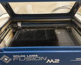 2017 Fusion M2, CO2 Laser, 20" x 32" bed, 120-watt, includes vector cutting honeycomb bed insert and air pump. 