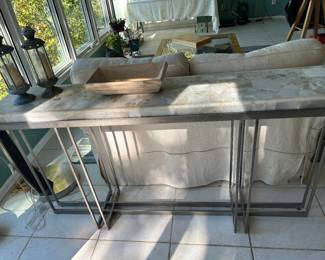 Hooker Melange Blaire console table. Metal base with composite stone top
