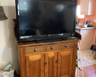 Cabinet and tv