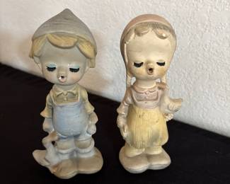 vintage figurine girl and boy singing chalkware