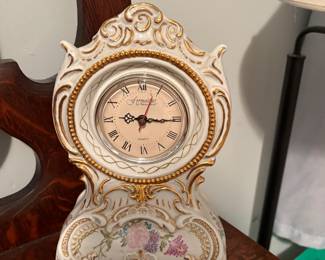 Porcelain mantle clock Formalities by Baum Bros.