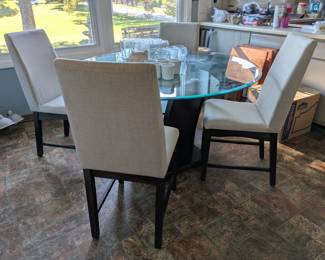Modern style glass top table with 4 fabric chairs